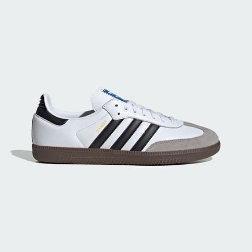 White adidas Samba OG trainers with black stripes and a gum sole